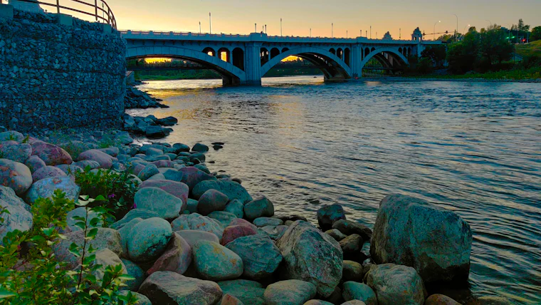 The Centre Street Bridge over the Bow River in Calgary at sunset